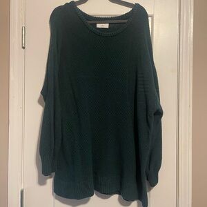 Oversized tunic style sweater.